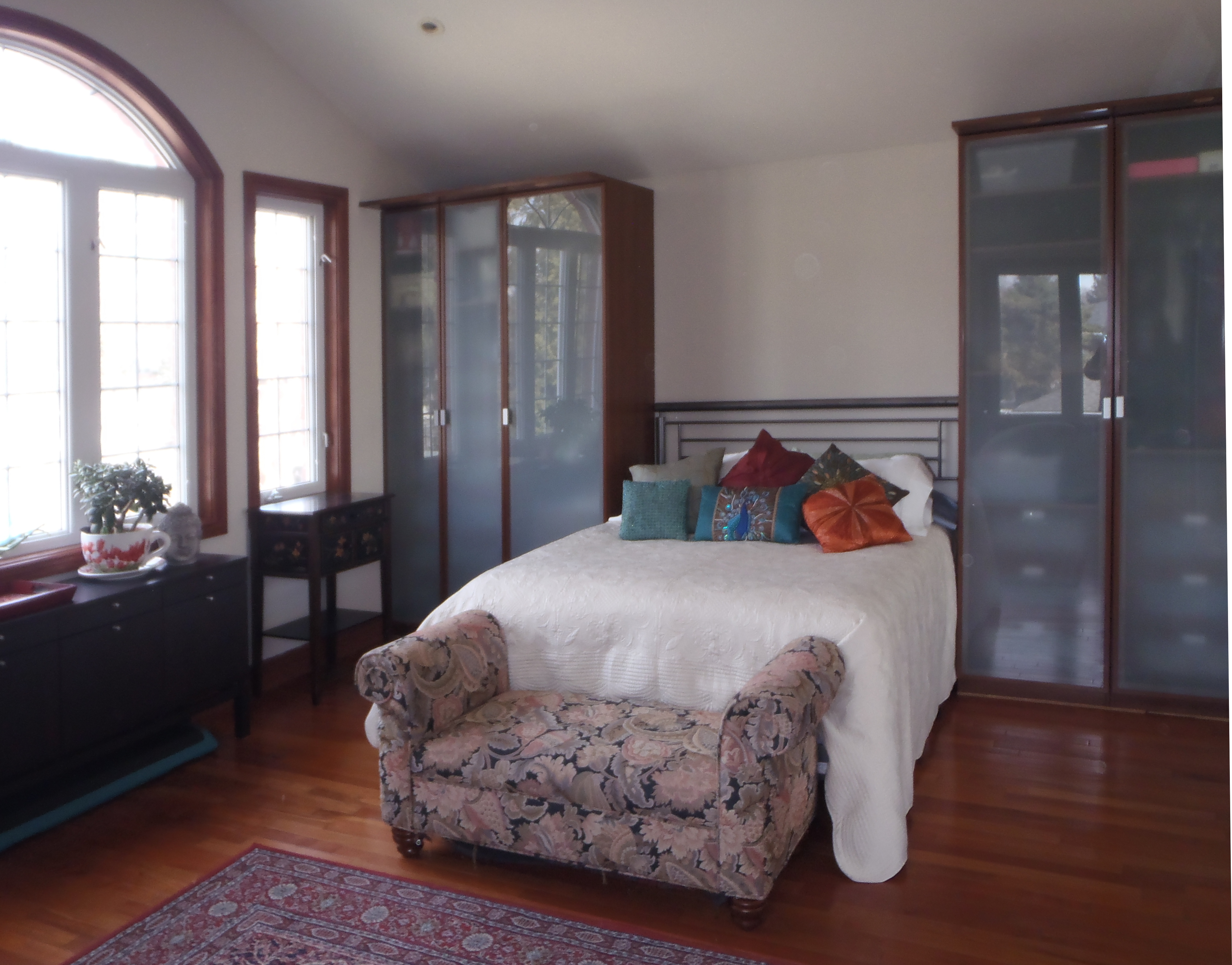 master bedroom with cathedral ceiling